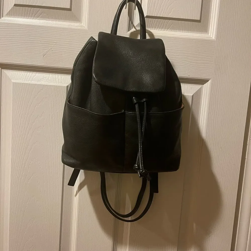 Tignanello Leather Black small Backpack string straps closure.